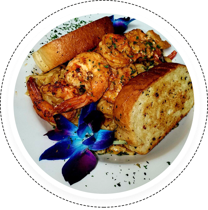 A plate of food with bread and shrimp.