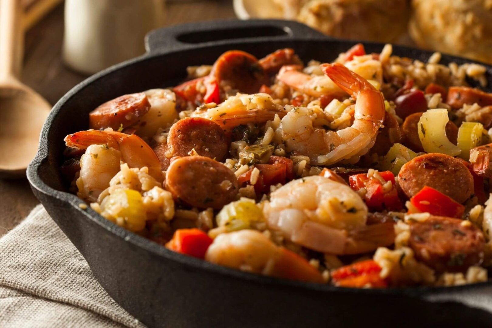 A pan of food with shrimp and rice.